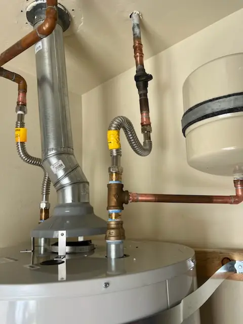 Water heater installation and plumbing repair in Malverne